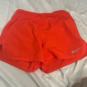 nike reddish orangey shorts